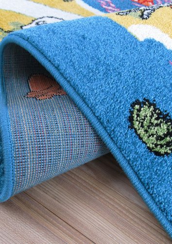 Dětský kusový koberec Afrika modré barvy 4sleep detail lemování